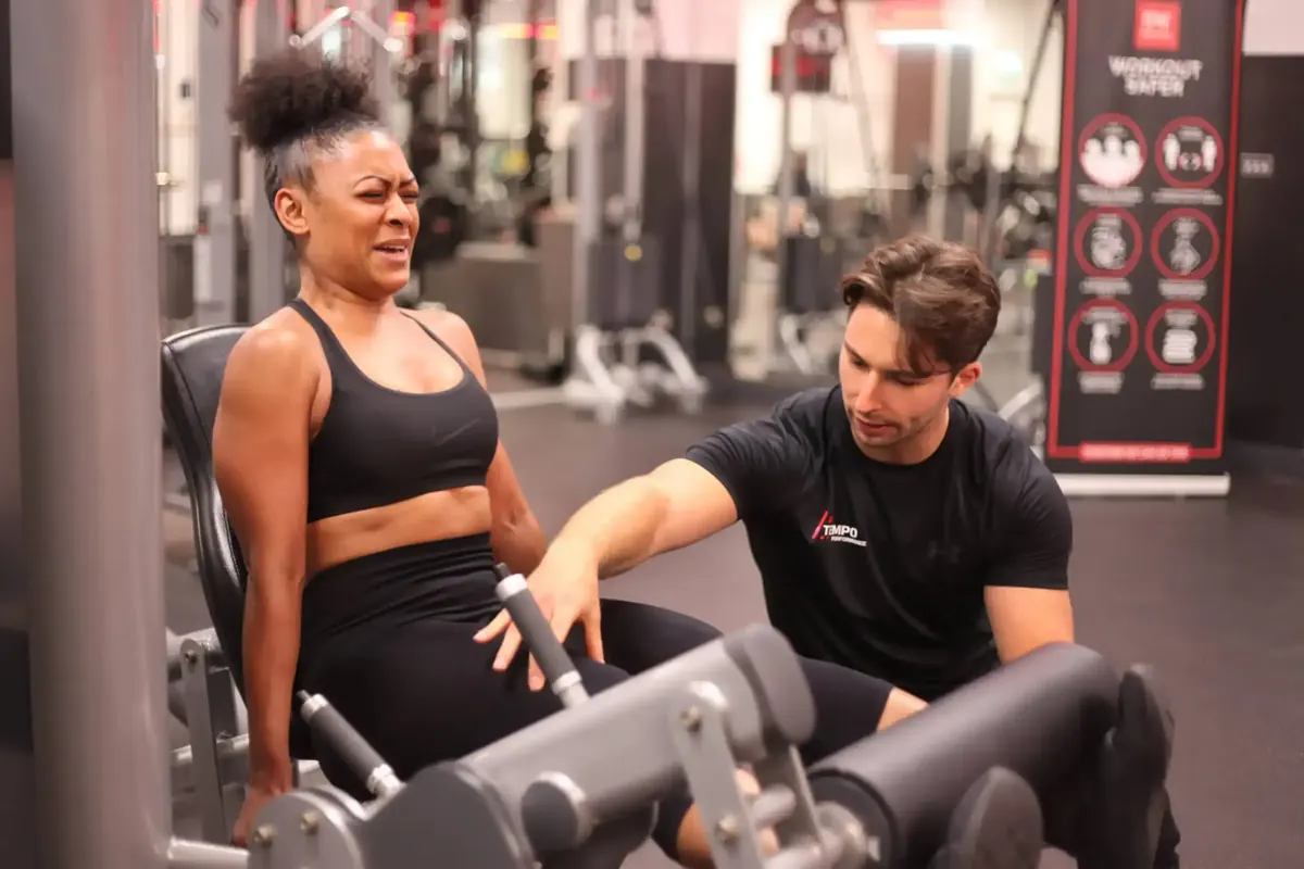 Julian Ernst working directly with a client at Tempo Performance